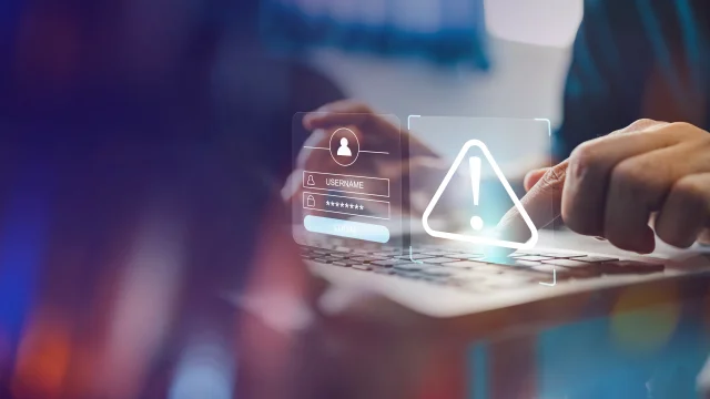 Concept of cyber crime and cyber security. Hand using laptop and show malware screen with phishing email, hack password and personal data. hackers, Virus Trojans, Encription Spyware or Malware.